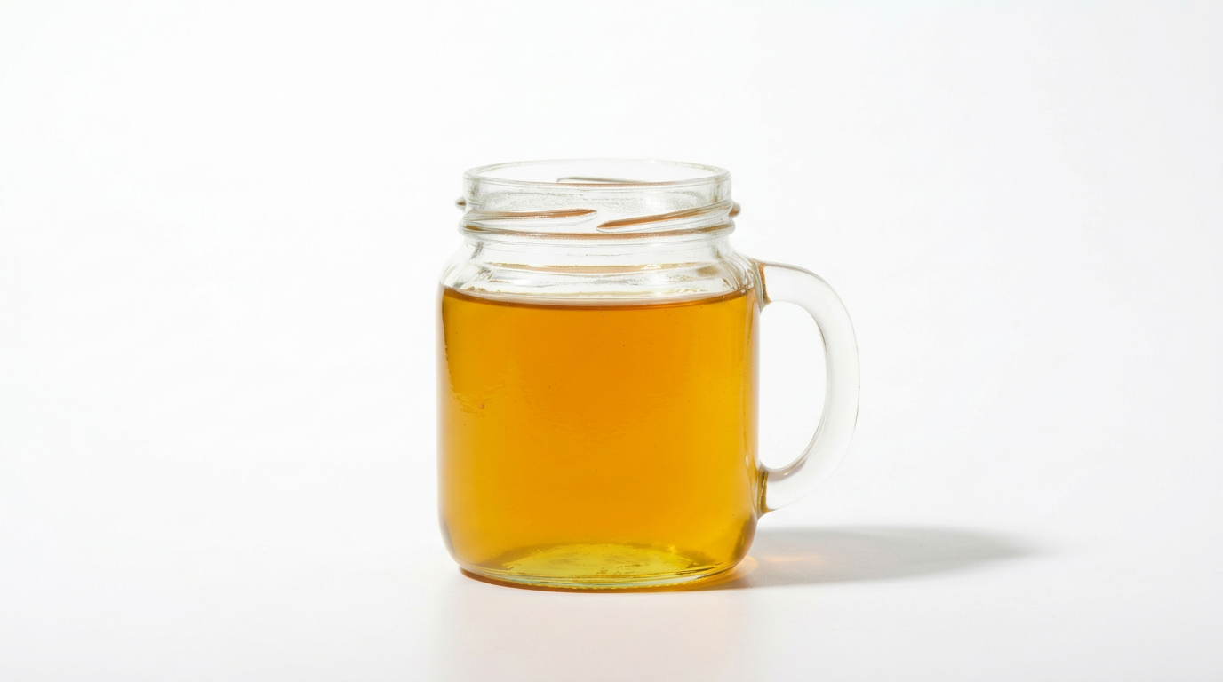 Premium Dandelion honey in glass jar